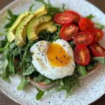 Poached Egg & Arugula Salad with Avocado, Tomato & Cream Cheese Toast