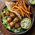 Chicken Meatball Pita Bowls with Seasoned Fries and Feta